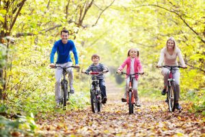 healthy family on bicycles